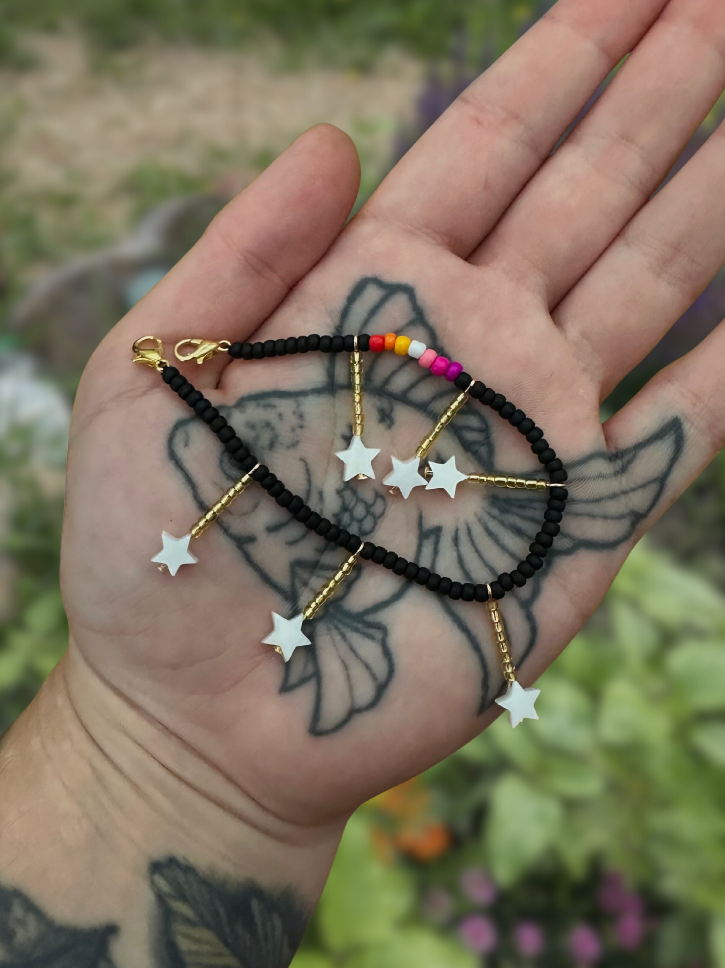 lesbian black beaded mask chain with dangly stars