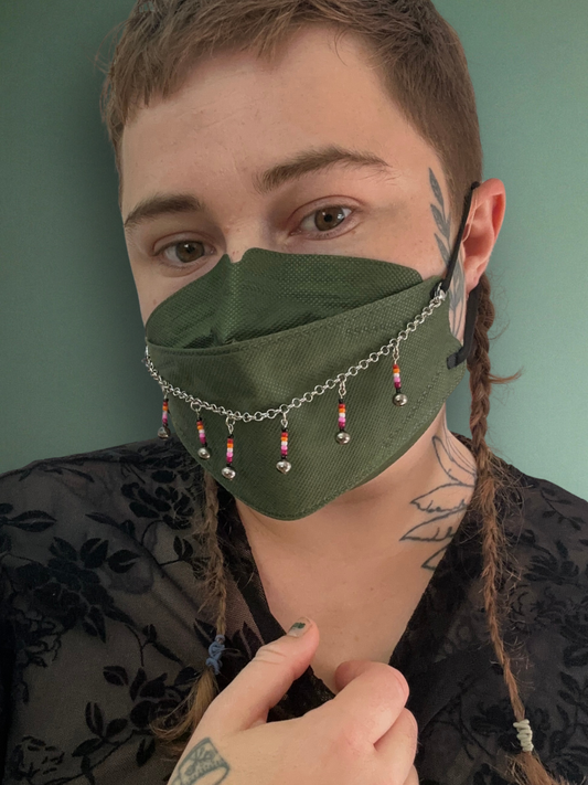 silver mask chain with lesbian flag dangles