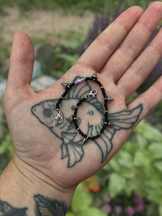 spikey black trans flag beaded mask chain