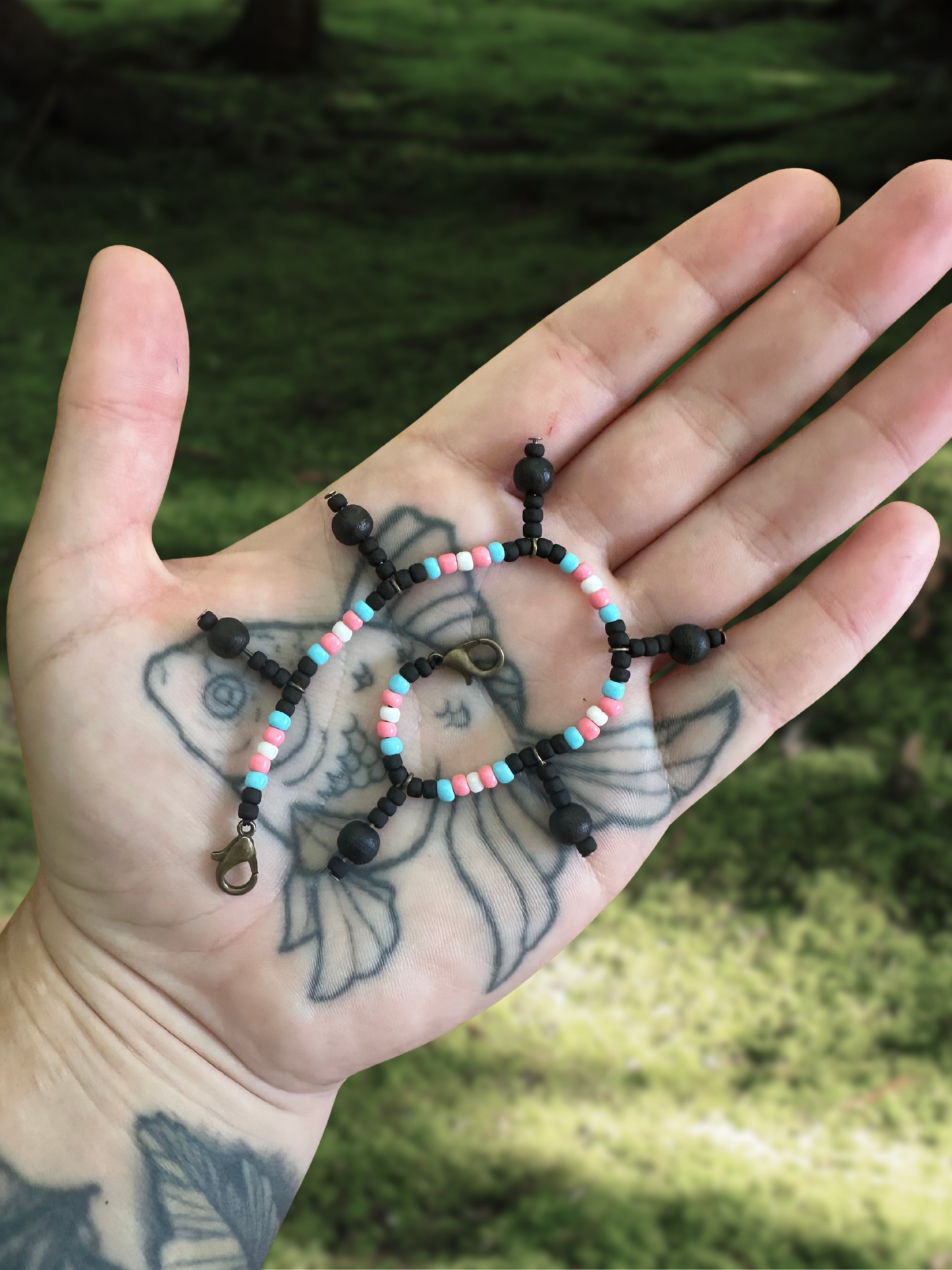 trans flag beaded mask chain with black dangles